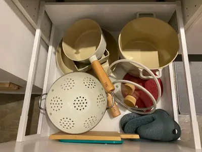a drawer filled with various kitchen utensils at San Lorenzo Place Condominium Makati City in Manila