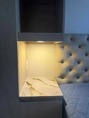 a small room with a small bed in it at Cozy Minimalist Staycation in Manila