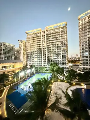 a view of a large city with tall buildings at Staycation in Casitas in Manila