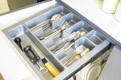 a drawer filled with dishes and utensils in a kitchen at Serene City Abode in Santa Rosa