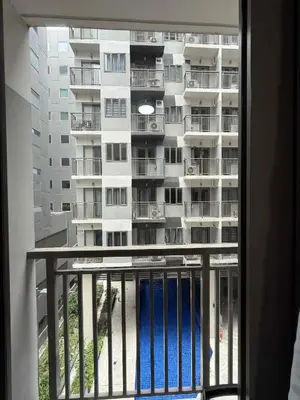 a view of a apartment building from a window at Simple Stays at S Residence Pasay in Manila