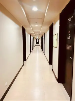 a corridor of an office building with a long hallway at A Secret Space in Sucat Parañaque in Manila