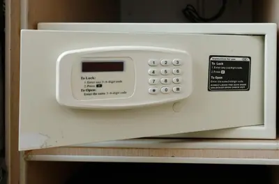 a microwave oven sitting on top of a shelf at LivStudios Manila Bay in Manila