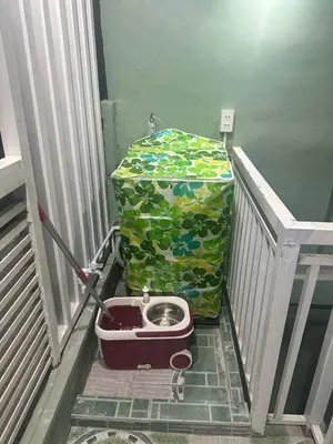 a box sitting on the floor next to a stairs at SJ Vistacation