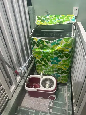 a box with a printer on the floor next to a bag at SJ Vistacation