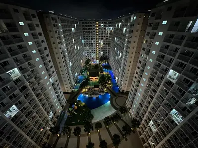 an aerial view of a courtyard between two tall buildings at Shore Residence Casa Margarita in Manila