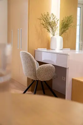 a desk with a chair next to a desk at Luxury 1 BR City View in Park Mckinley West Fast Wi-Fi Washer Dryer in Manila