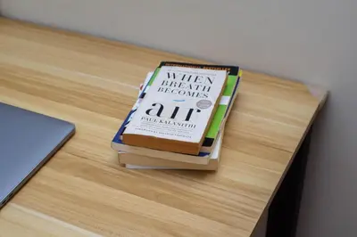 a book sitting on top of a table at Vue Urbain Moderne - Knightsbridge Poblacion Makati Studio in Manila
