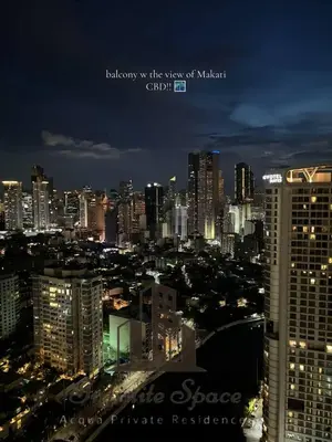 a view of a city skyline at night at Staycation in Detifoss in Manila