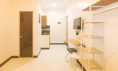 a small room with a desk and a chair at UrbanView at Mherylle's Apartment near UST Manila in Manila