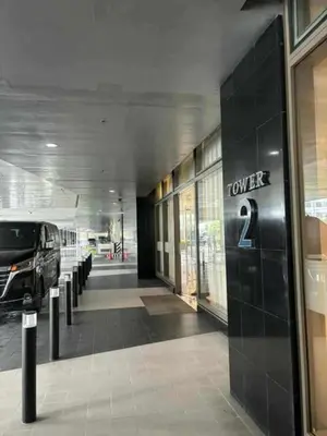 a building with a car parked in a hallway at Mystix's Pad in Manila
