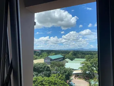 a view from a window of a building at HOPE RESIDENCES UNIT 606 building D in Trece Martires