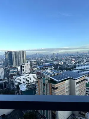 a view of a city with skyscrapers and buildings at City SkyView - Level 24 - Pool - Lush Residences in Manila