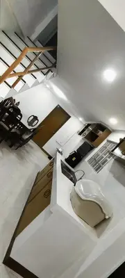 a room with a sink and a toilet in it at Thai Nee Homestay in Manila