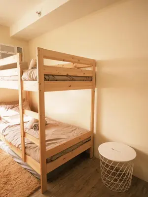 a bunk bed room with two bunk beds at ANANDA SQUARE studio unit in Manila