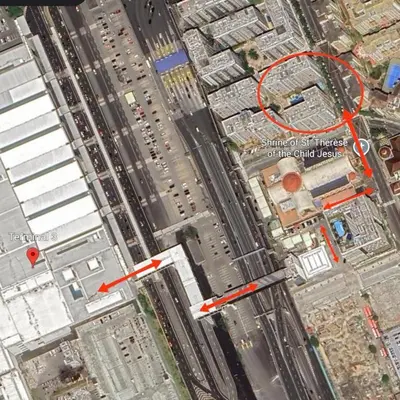 an overhead view of a city with a red circle at Condo in Pasay Across Airport NAIA Terminal 3 Pool View in Manila