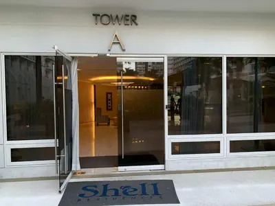 a shil recruitment sign in front of a building at Shell Residence MOA Pasay by Kathy in Manila