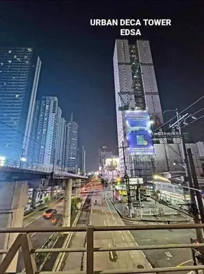 a view of a city street at night with buildings at Erro Place Wi-Fi 200mbps & Netflix in Manila