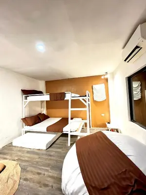 a bedroom with two bunk beds in a room at Boxify Cabins