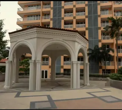 an arch in front of a large building at Venice Luxury Residences Grand Canal View- Tower E in Manila
