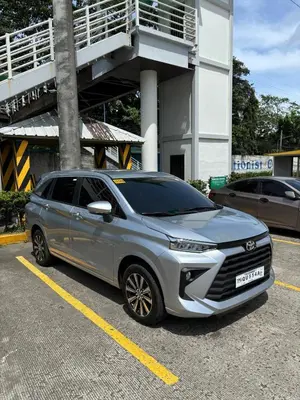 a silver suv parked in a parking lot at Big Beautiful House in Pasig in Manila