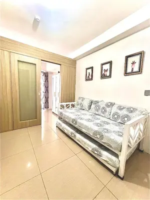 a bedroom with a bed in a room at 1 bedroom near MOA NAIA with parking slot included pls send valid ids of guests after booking in Manila