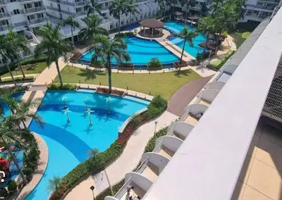 an overhead view of a pool at a resort at Ultra Pasay City Apartment for Rent - Perfect for Short-Term Stay Front of MOA in Manila