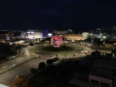 a city at night with a lot of traffic at Shell Residence Pasay MOA 2br by G&K in Manila
