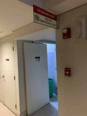 a sign above a door in an emergency room at Shell Residence Pasay MOA 2br by G&K in Manila
