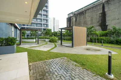 a park with a pavilion in a city at Boho Makati Condo w/ Wi-Fi + Workspace | Red in Manila