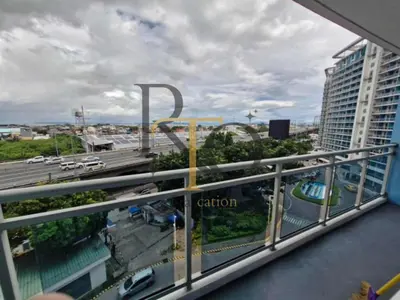 a balcony with a view of a parking lot at RTO Staycation in Manila