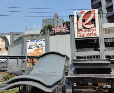 an empty playground in front of a building at EDSA Heights Penthouse unit 3402 AMA Tower Residences in Manila