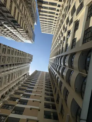 two tall buildings looking up at the sky at Sy bay suites beside okada manila near MOA COD T3 MSV2117H in Manila