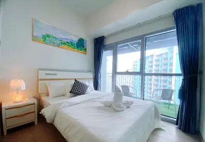 a bedroom with two beds and a large window at 120 Sqm Modern 3 Bedrooms HighRise Facing Manila Bay Sunset, Near Manila Airports, Okada Casino, Solaire Casino, MOA with Free Parking in Manila
