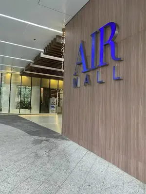a building with a amazon sign on the side of it at Air residence city view staycation in Manila