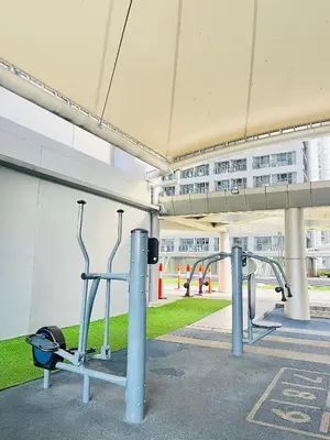 a row of gym equipment in a building at Cami Haus at Fame Residences in Manila