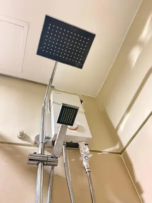 a light on the ceiling in a room at Cami Haus at Fame Residences in Manila