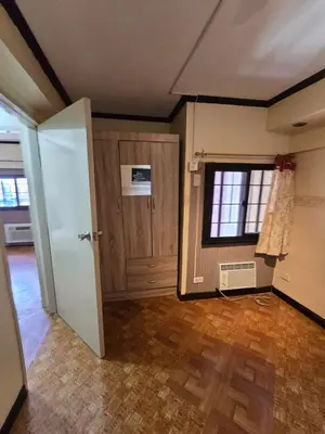 an empty room with a door and a window at Greenhills Garden Square Residences 2BR & 2 Toilets Quezon City in Manila