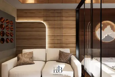 a living room with a white couch and a glass wall at Premium Unit in Maldives in Manila