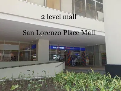 a building with the words san lorenzo place mall at 1 Br - Royalty Vacation - Edsa Makati in Manila