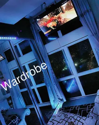 a room with windows and a sign that says navaho at 1 Br - Royalty Vacation - Edsa Makati in Manila