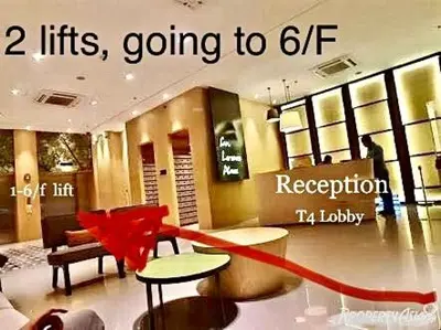 a store with a red ribbon in a room at 1 Br - Royalty Vacation - Edsa Makati in Manila