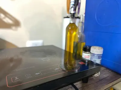 a close up of a table with a blender and bottles at Staycation and WFH with Netflix and Pool for up to 4 guests in Manila