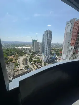 a view of a city from the top of a building at Staycation by Purple Tree in Manila