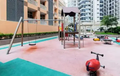 an empty playground with a play equipment at Casa Venice Rustic Pet Friendly Studio Balcony in Manila