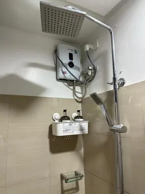 a shower in a bathroom with a shower at S&B rentals in Manila