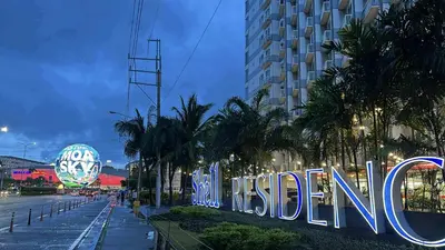 a sign that says welcome in front of a building at Shell residence Family room by Kathy in Manila