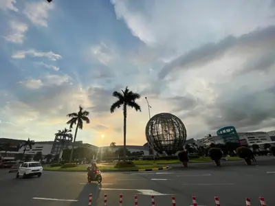 a group of people riding motorcycles in a parking lot with palm trees at Peaceful & Calm 1BR Studio l Near MOA, SMX & NAIA in Manila