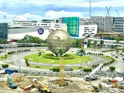 a construction site with a large ball in a city at Moments Staycations in Manila