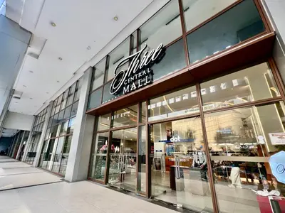 a store front of a shopping mall with a sign on it at Mandala Stays - The Family Suite in Manila